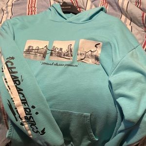 Teal new york hoodie. Lightly used and Size M